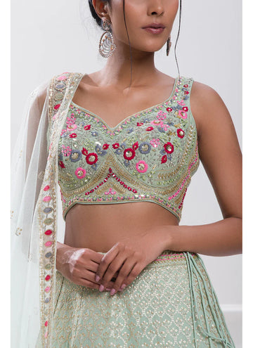 Party wear Sea green Designer lehenga with real mirror and sequin thread work.
